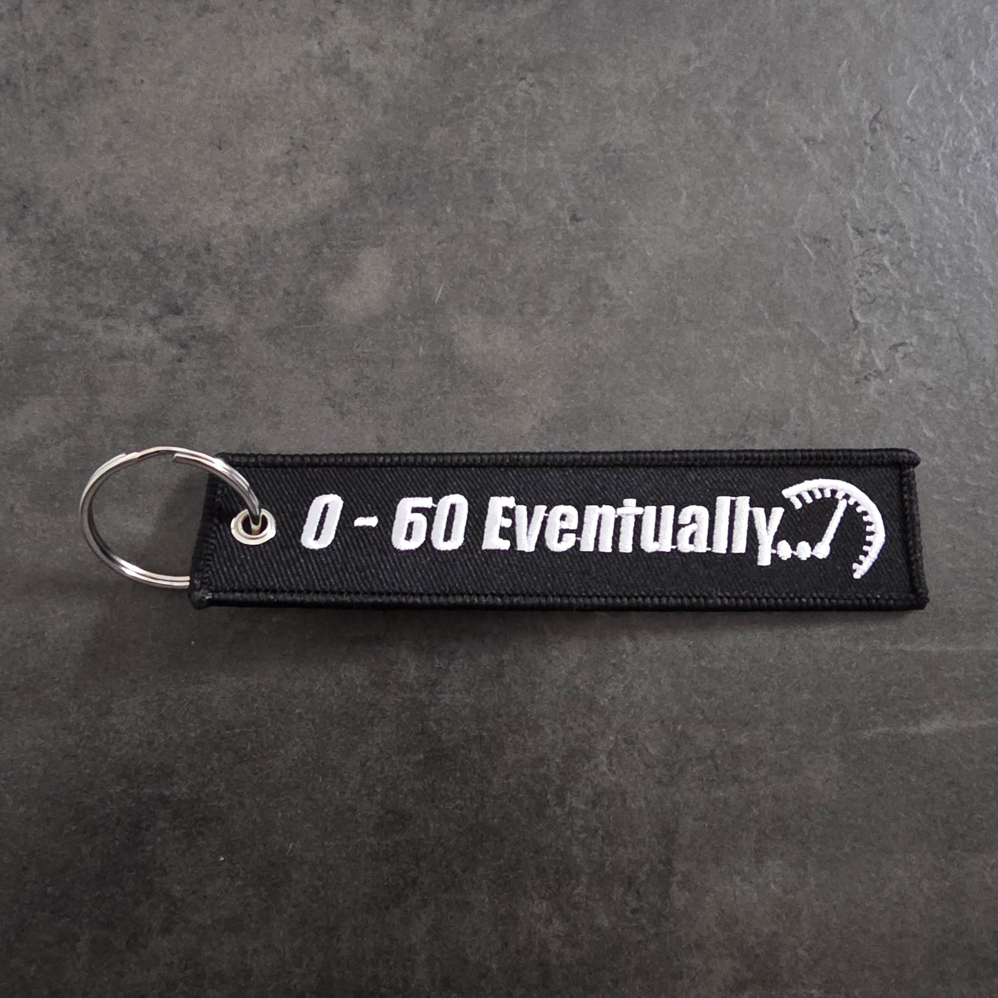 ZERO TO SIXTY EVENTUALLY KEYCHAIN